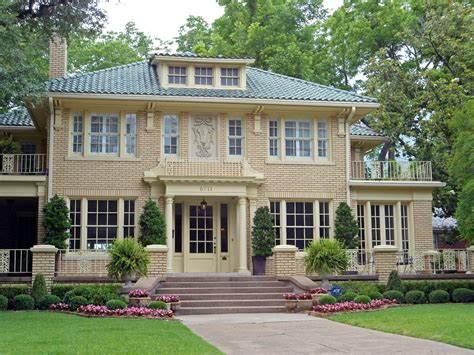 yellow brick house with metal roof|yellow brick exterior house.